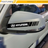 Close-up detail of Hard Goat Hyundai side mirror sticker with black racing stripes and white logo