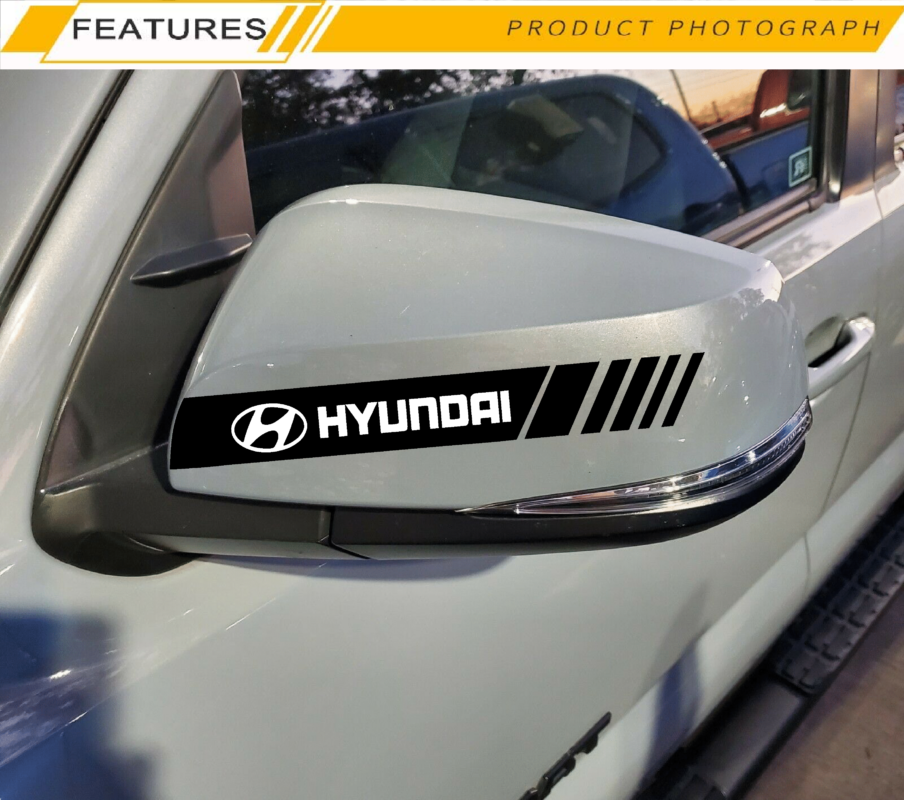 Close-up detail of Hard Goat Hyundai side mirror sticker with black racing stripes and white logo