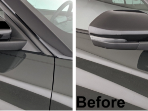 Hard Goat Hyundai side mirror sticker with black stripes in rain showing waterproof feature