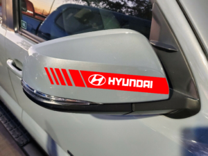 Hyundai Verna (white) featuring Hard Goat red stripes side mirror sticker
