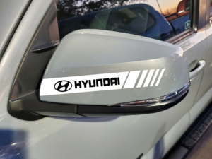 Hyundai Alcazar with Hard Goat universal fit side mirror sticker, showing its broad fit.